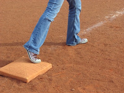 Feet_on_a_baseball_base